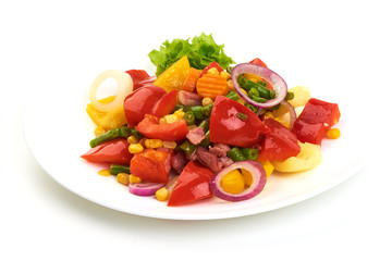 Healthy snack of assorted farm fresh roast vegetables in a white plate, isolated on white backgound.