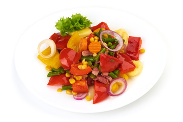 Healthy snack of assorted farm fresh roast vegetables in a white plate, isolated on white backgound. Top view.