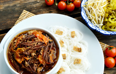 Rice noodles with spicy pork sauce Thai Northern Style (Thai name is Kanomjeen NamNgeaw)