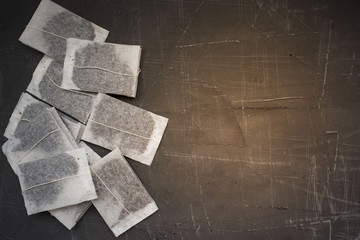 tea bags on a concrete background, a place for advertising and inscriptions, copy space