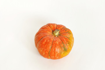 Isolated photo of pumpkin. Orange pumpkin on the white background. use for postcards, wallpapers, textiles, scrapbooking, decoration, invitations, background, holiday.