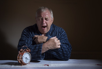 Tired mature man suffering from a sleepless night