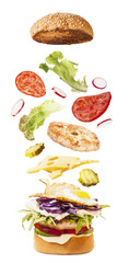 Big tasty homemade burger with flying ingredients