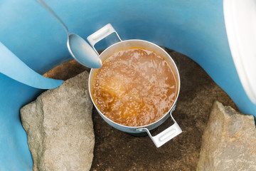 Soup cooking on a gas burner