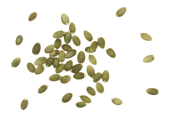 Pumpkin seeds isolated on white background, top view