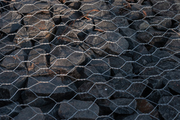 Steel mesh on top of the stones