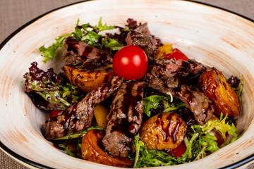 Sliced beef steak with potato
