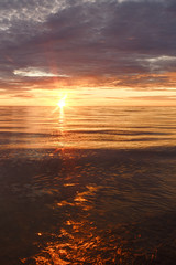 Fototapeta na wymiar Majestic summer sunset over the Chudskoy lake