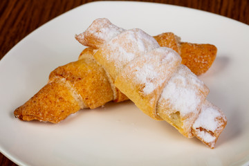 Croissant with shugar powder