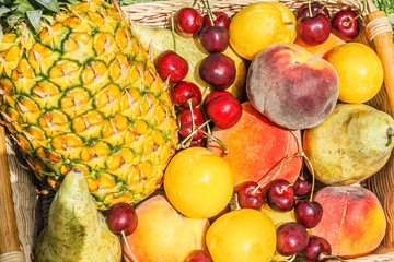 close-up harvest of fruits and berries for sweet dessert