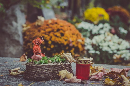 cemetery decorated at All Saints Day time