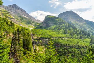 Naklejka na ściany i meble The Road to the Sun Hugs the Steep Landscape of Montana's Glacier National Park