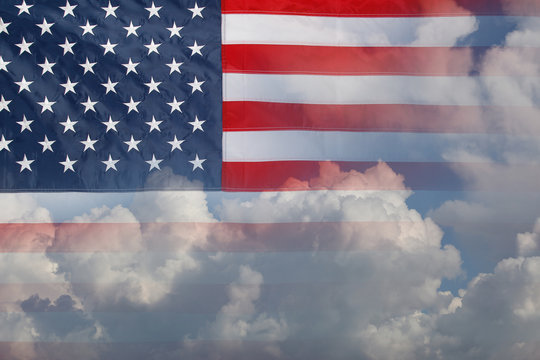 American flag and clouds