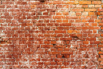 Fototapeta na wymiar Red old worn brick wall texture background