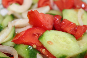 fresh vegetable salad with tomatoes and cucumbers