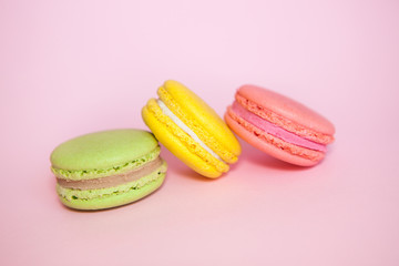 French macaroon biscuit on pink table