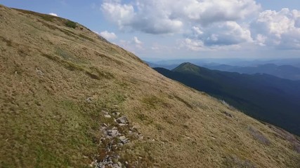 Amazing aerial view of the Carpathian mountains in sunny day drone footage