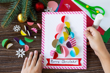 Christmas tree greeting card. Handmade. Project of children's creativity, handicrafts, crafts for kids.