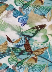 Fond textile aux papillons dessinés.