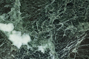 The dark green marble. Texture