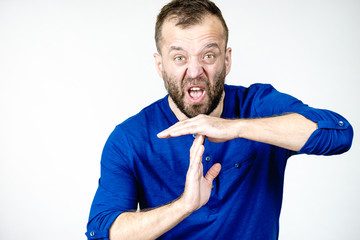 Man showing time stop gesture