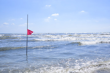 Rough sea. Bathing danger red flag