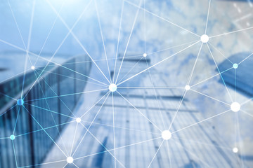 Blockchain network on blurred skyscrapers background. Financial technology and communication concept.