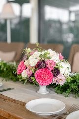 Wedding Banquet or gala dinner. The chairs and table for guests, served with cutlery and crockery....