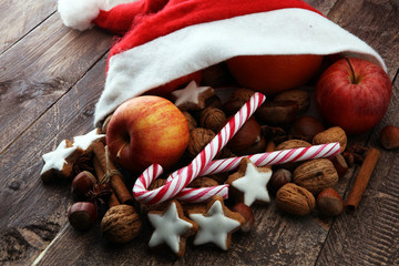 christmas cookies and santa had with spieses, nuts and fruits.
