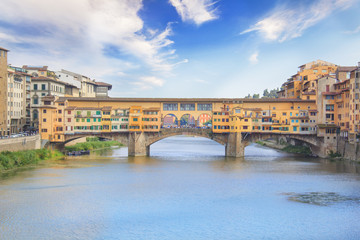 Naklejka premium Beautiful view of the Ponte Vecchio bridge across the Arno River in Florence, Italy