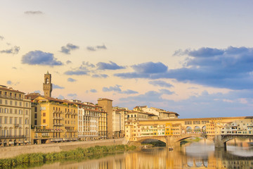 Beautiful view of the Ponte Vecchio bridge across the Arno River in Florence, Italy