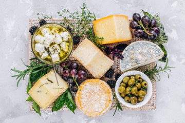 Fototapety  Cheese plate, top view