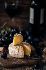 Young cheese with red wine