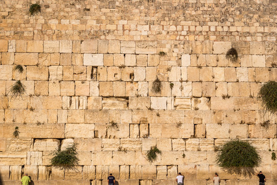 Jews praying at the Wailing Wall. The Western Wall, called Wailing Wall or Kotel, is a surviving remnant of the Temple Mount and the holiest place for Jews