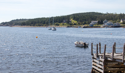 Boats in water, wide shot.