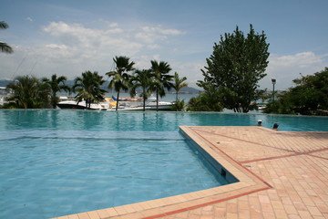 swimming pool in tropical resort