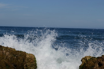 waves crashing on rocks