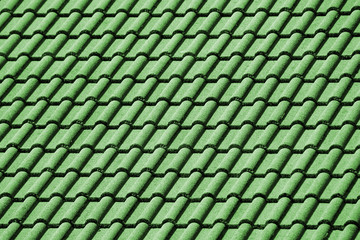 Decorative green tiles on the roof
