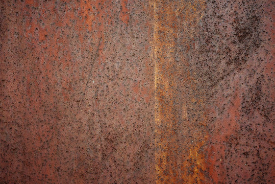 Old rusty wall background. Metal grunge rust texture