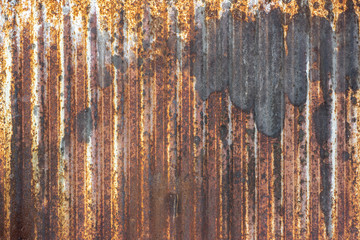 Rusted metal sheet seamless texture with vertical ridges