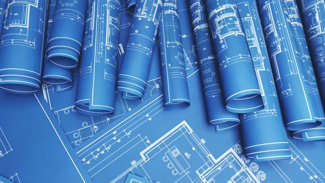 Stack of classic architectural blueprint rolls. Drawings of project plans. 4KHD