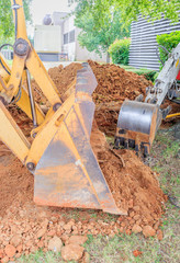 Front End loader Front Bucket:  Front end loader front bucket at a controlled digging site.