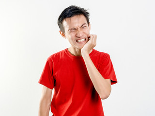 Headshot man toothache on white background. Asians wear red short sleeves.