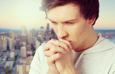 Portrait of Handsome Young man  praying