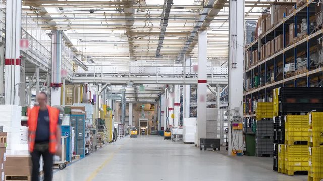 Time lapse inside a modern manufacturing industrial workplace