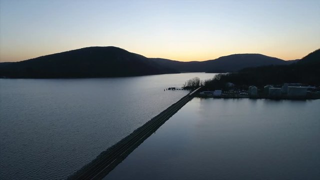 Aerial View of Train Tracks Over the Hudson River at Sunset 