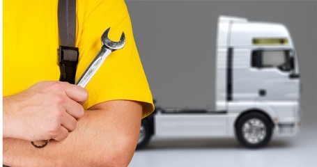 Male hand holding car tool