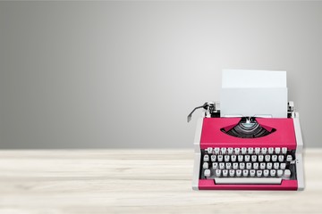 Old typewriter with paper  on background