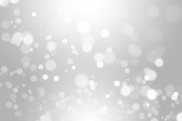 silver bokeh light background beautiful bright blurred glitter effect. decoration for your design