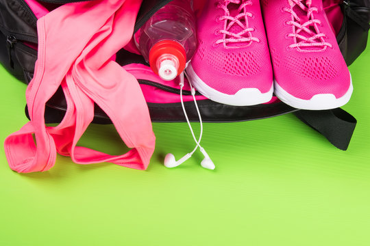 Pink Things For Playing Sports On A Green Background